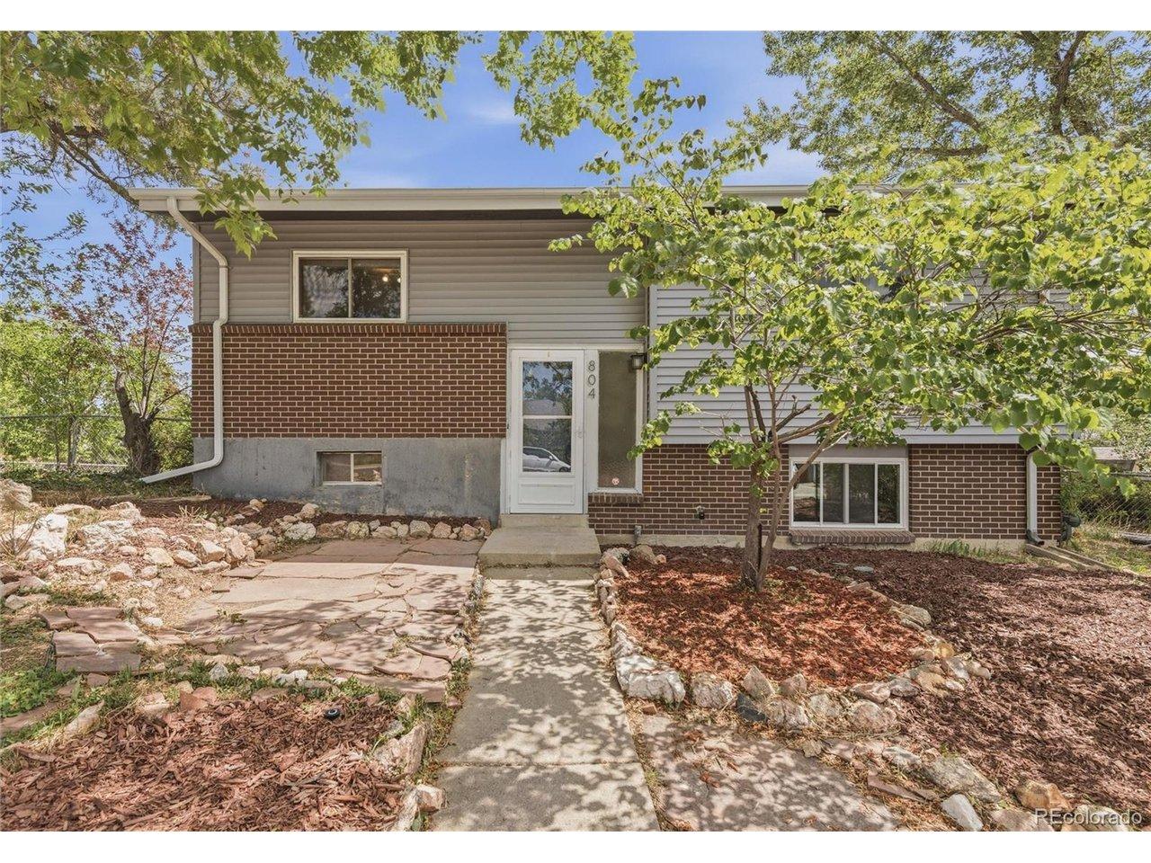 Image 3: Classic brick and siding split-level at 804 S. Queen Way, Lakewood CO 80226. Corner lot, mature landscaping, and a welcoming front entry. Image 3: Classic brick and siding split-level at 804 S. Queen Way, Lakewood CO 80226. Corner lot, mature landscaping, and a welcoming front entry.