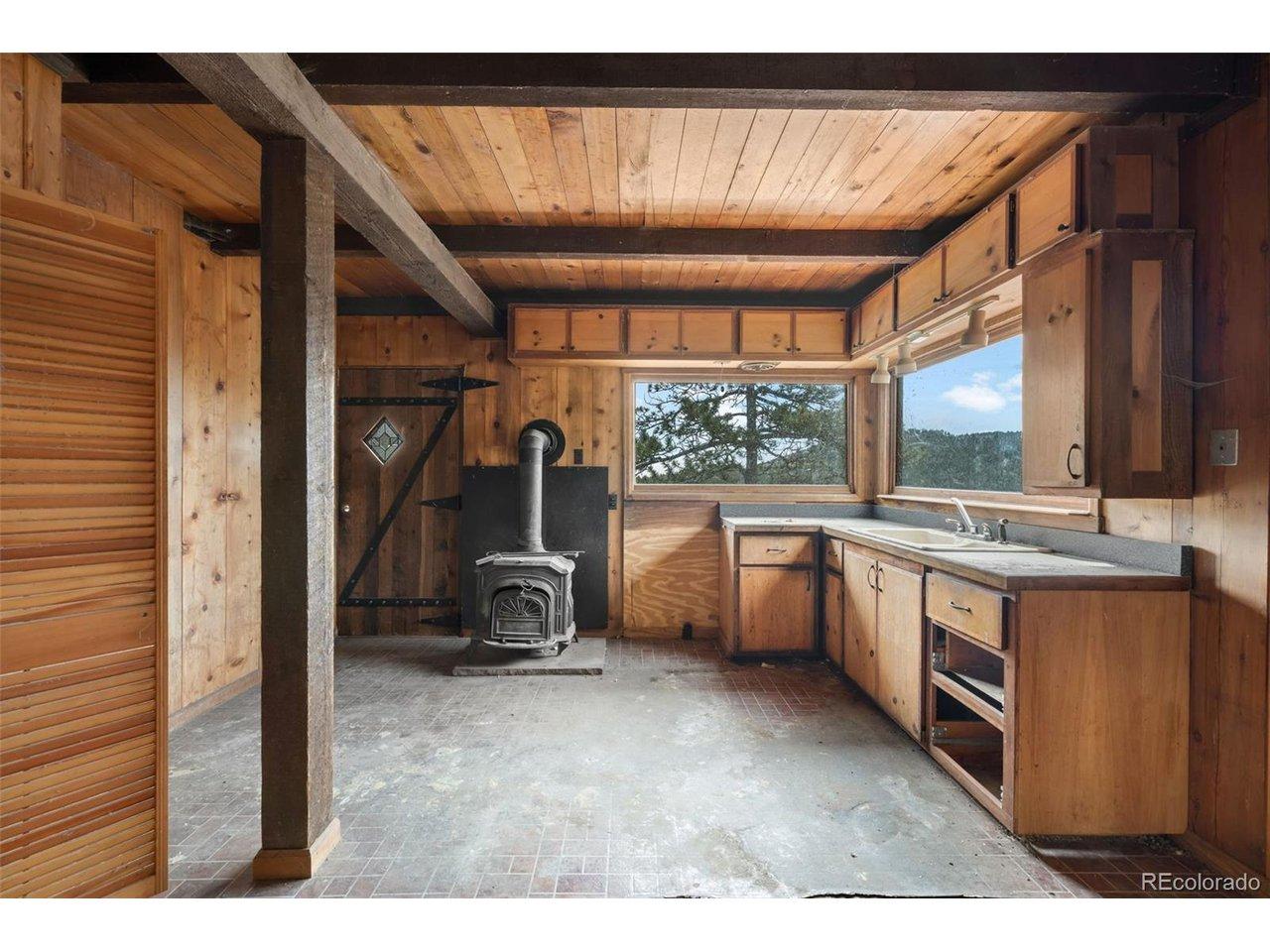 Image 4: Rich wood details, dramatic floor-to-ceiling fireplace, and endless opportunities! Image 4: Rich wood details, dramatic floor-to-ceiling fireplace, and endless opportunities!