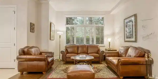 Image 4: Living room with tree views and gas fireplace Image 4: Living room with tree views and gas fireplace