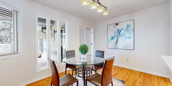 Image 4: Formal dining space with natural hardwoods and open to the kitchen Image 4: Formal dining space with natural hardwoods and open to the kitchen