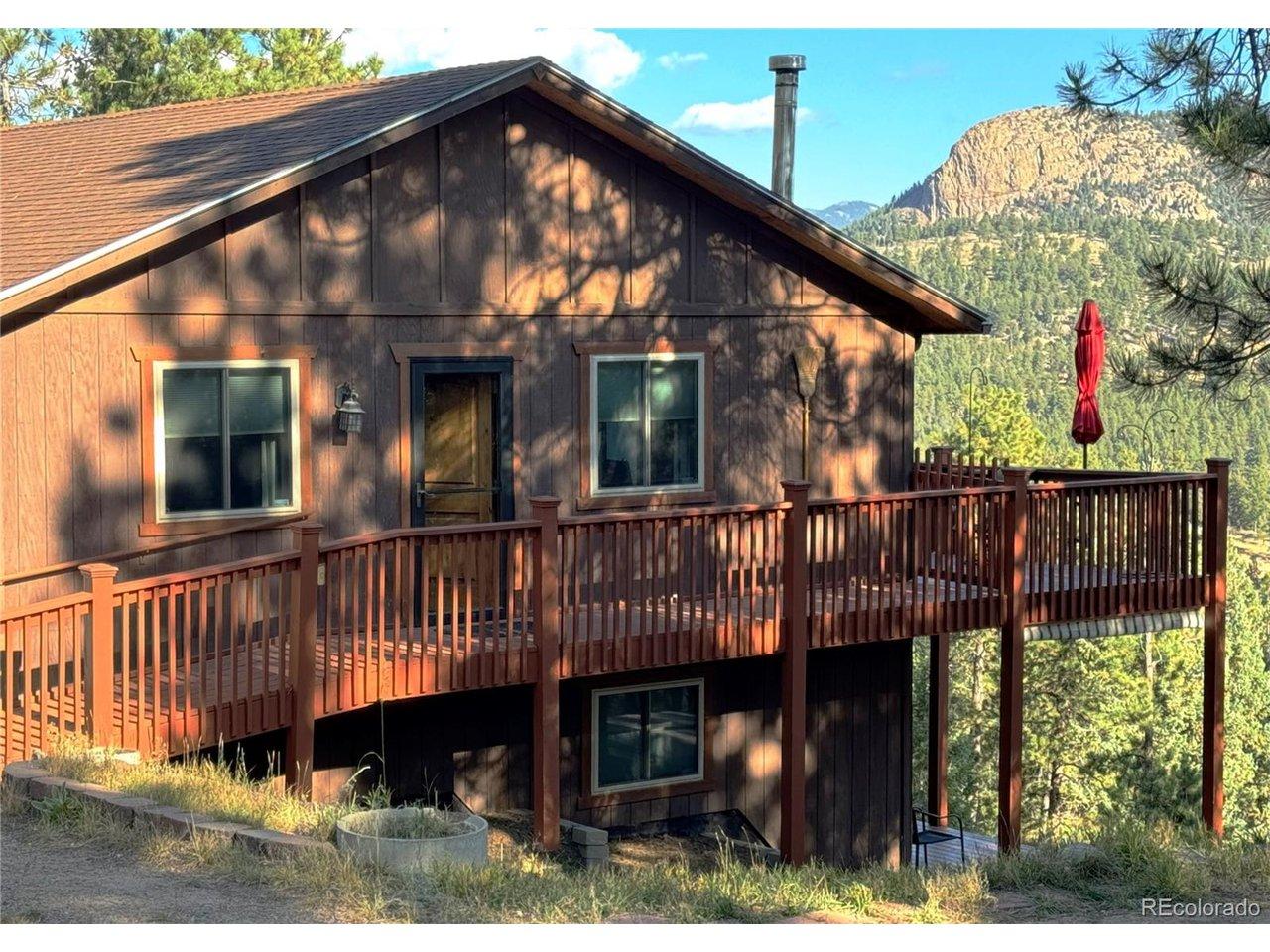 Image 2: This home offers stunning views of Lone Rock from the back deck. Image 2: This home offers stunning views of Lone Rock from the back deck.