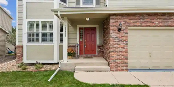 Image 3: A welcoming entry with brick accents, mature landscaping and a welcoming covered front porch. Image 3: A welcoming entry with brick accents, mature landscaping and a welcoming covered front porch.