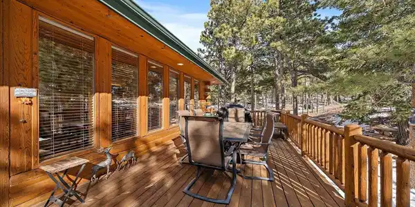 Image 2: Plenty of room on the front deck to take in the beautiful mountain surroundings. Image 2: Plenty of room on the front deck to take in the beautiful mountain surroundings.