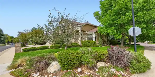 Image 2: Timeless curb appeal and mature landscaping create an unforgettable first impression. Image 2: Timeless curb appeal and mature landscaping create an unforgettable first impression.