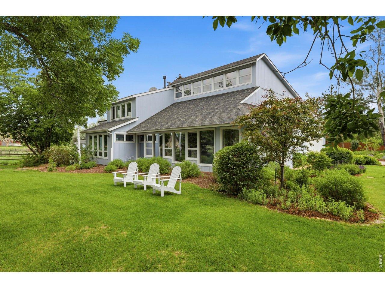 Image 3: A meticulously manicured oasis surrounded by pasture
