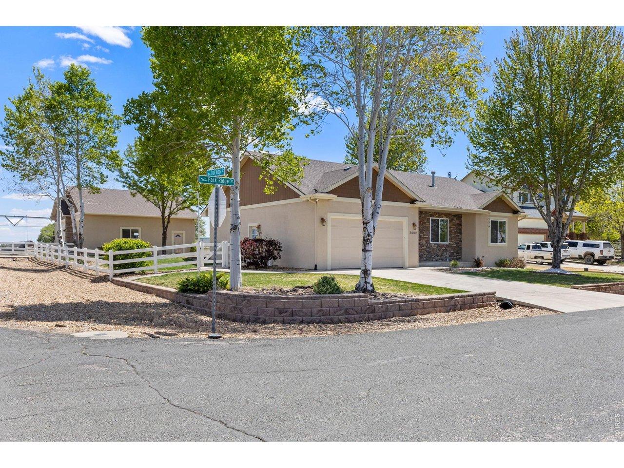 Image 1: Situated on a private corner lot in a quiet cul-de-sac, this property backs to farm ground offering a peaceful, tucked-away feeling while still being conveniently close to town and ample amenities. Image 1: Situated on a private corner lot in a quiet cul-de-sac, this property backs to farm ground offering a peaceful, tucked-away feeling while still being conveniently close to town and ample amenities.