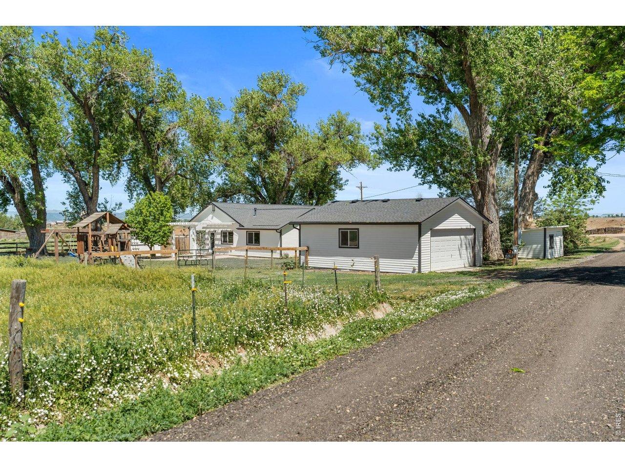 Image 3: Approximately 2.3 acres with THREE outbuildings (pictured above is outbuilding #1)