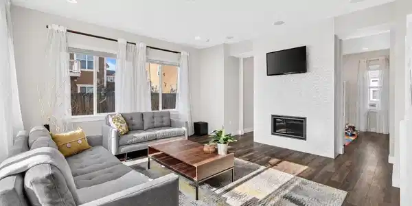 Image 3: Cozy fireplace is a must for chilly Colorado nights (virtually staged for paint color) Image 3: Cozy fireplace is a must for chilly Colorado nights (virtually staged for paint color)