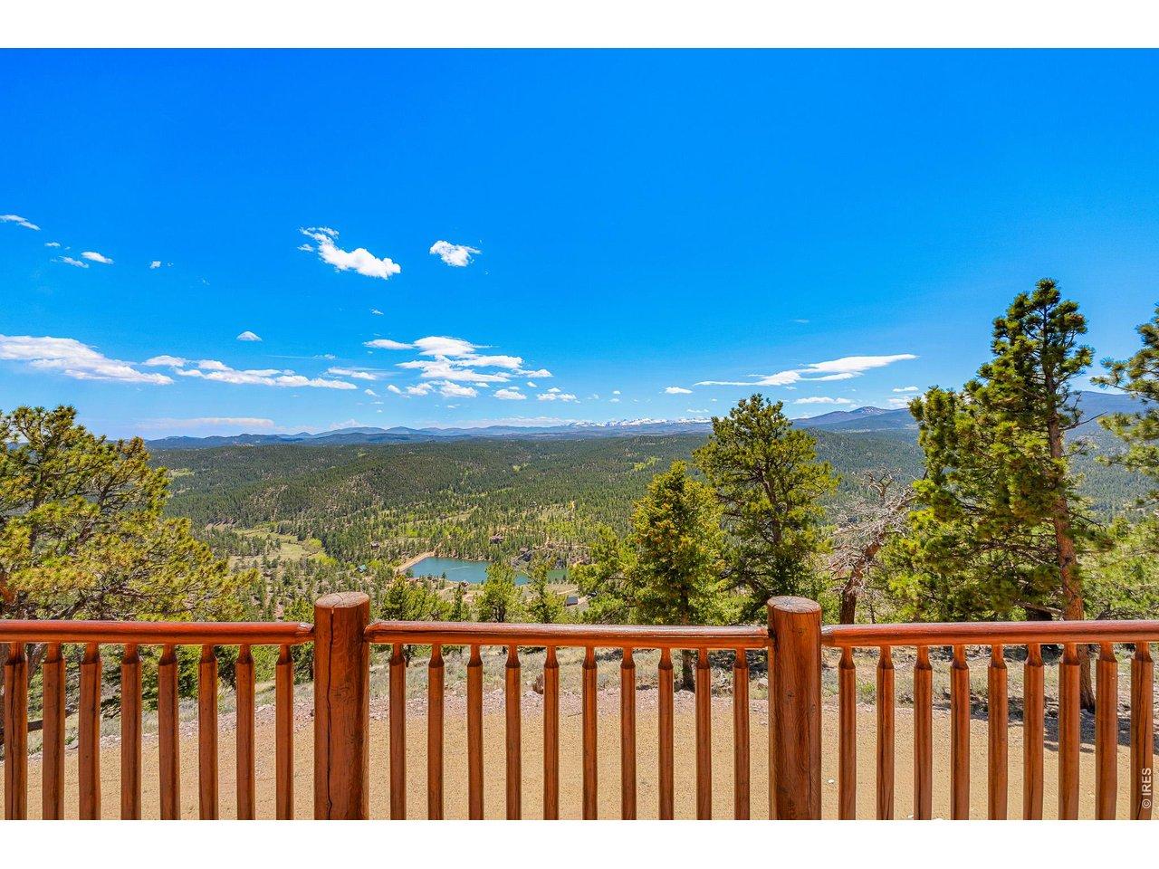 Image 3: from the back deck, take in the expansive views of the snowcapped mountains, valley and lake