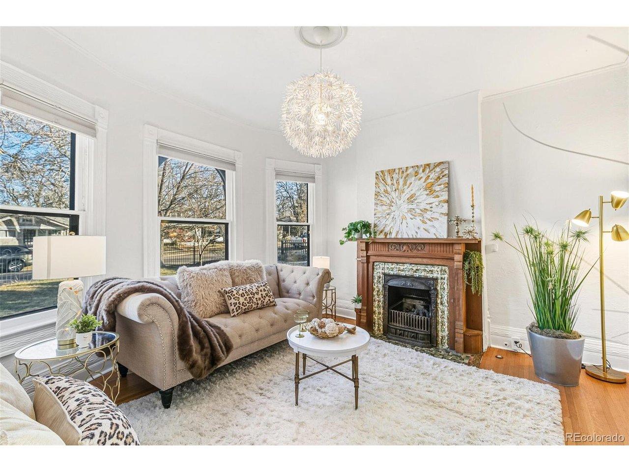Image 3: Formal Living Room with Original Gas Fireplace & Bay Window