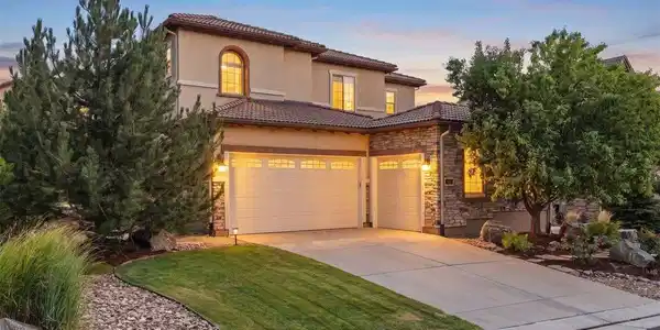 Image 2: Tile roof and 3 car garage