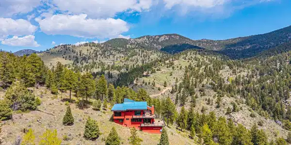 Image 3: Aspens and coniferous forests feel like high mountain living less than 40 minutes from Denver. Image 3: Aspens and coniferous forests feel like high mountain living less than 40 minutes from Denver.