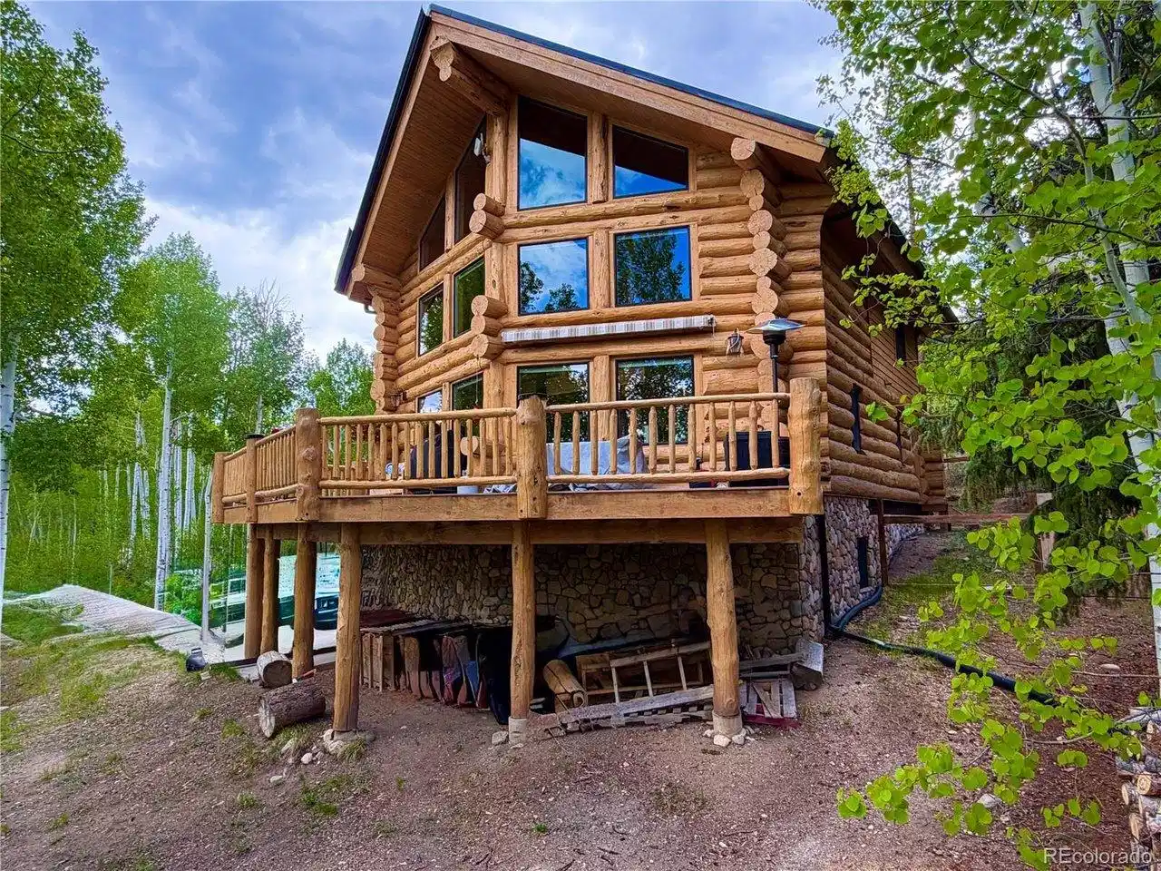 Image 1: Custom log home is a beautiful setting Image 1: Custom log home is a beautiful setting