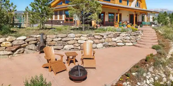 Image 4: Patio space overlooking the gardens, meadow and river Image 4: Patio space overlooking the gardens, meadow and river