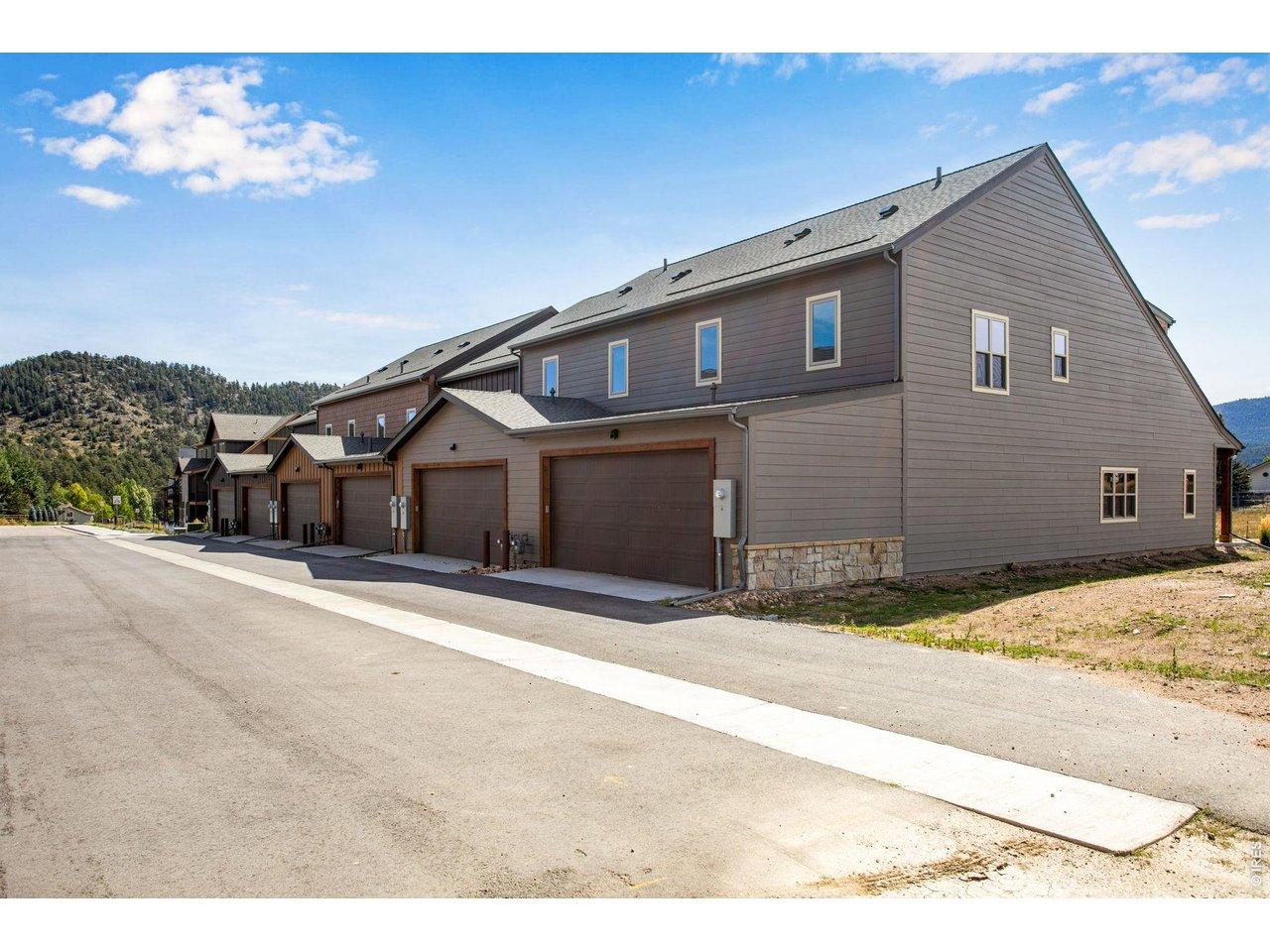 Image 3: Each townhome features an attached, heated, and finished two car garage Image 3: Each townhome features an attached, heated, and finished two car garage
