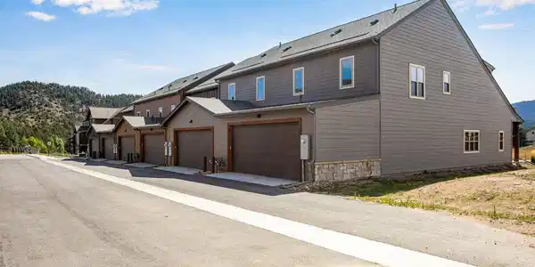 Image 3: Each townhome features an attached, heated, and finished two car garage Image 3: Each townhome features an attached, heated, and finished two car garage