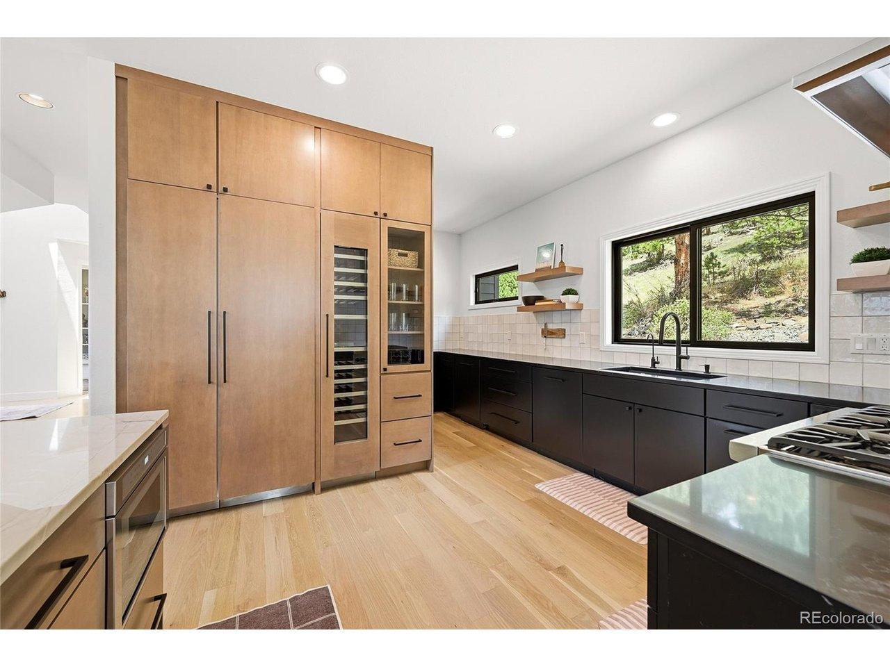 Image 2: Great design throughout such as this sleek, modern kitchen Image 2: Great design throughout such as this sleek, modern kitchen