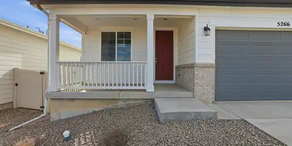 Image 3: Covered front porch to enjoy the Colorado sunshine. Image 3: Covered front porch to enjoy the Colorado sunshine.