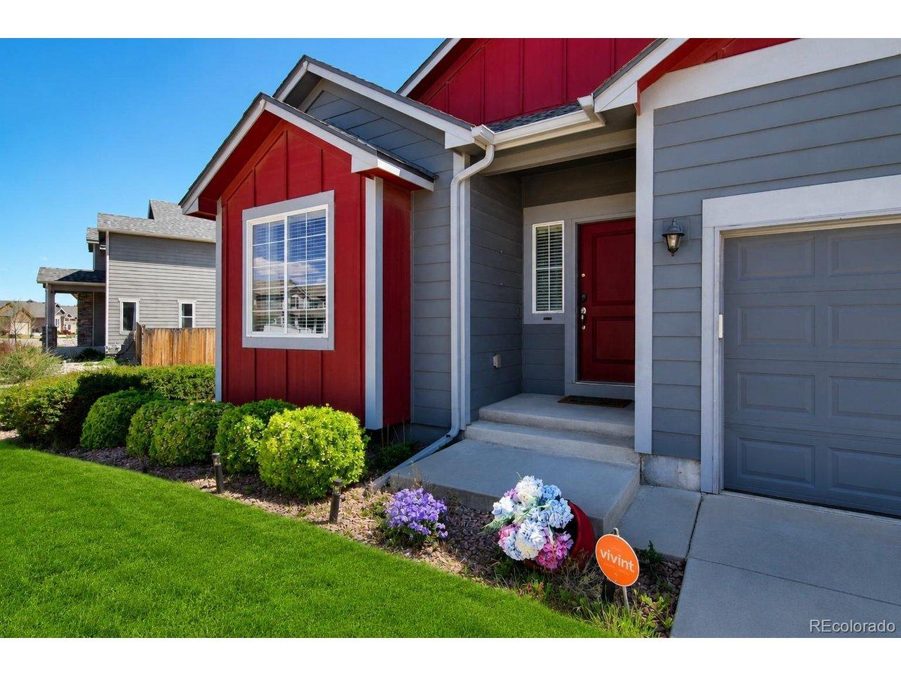 Image 2: Contemporary exterior featuring gray horizontal siding and red vertical siding accents Image 2: Contemporary exterior featuring gray horizontal siding and red vertical siding accents
