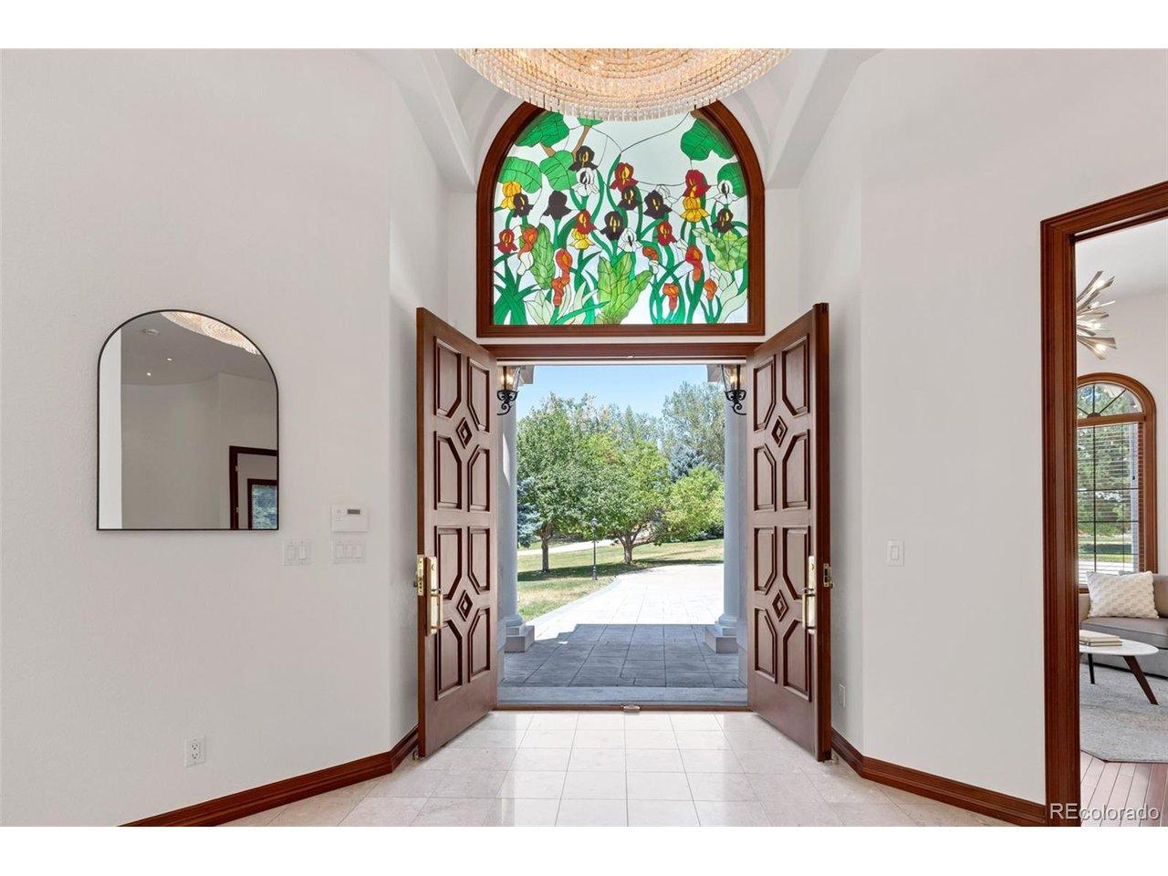 Image 3: Grand entry with double doors and custom stained glass Image 3: Grand entry with double doors and custom stained glass