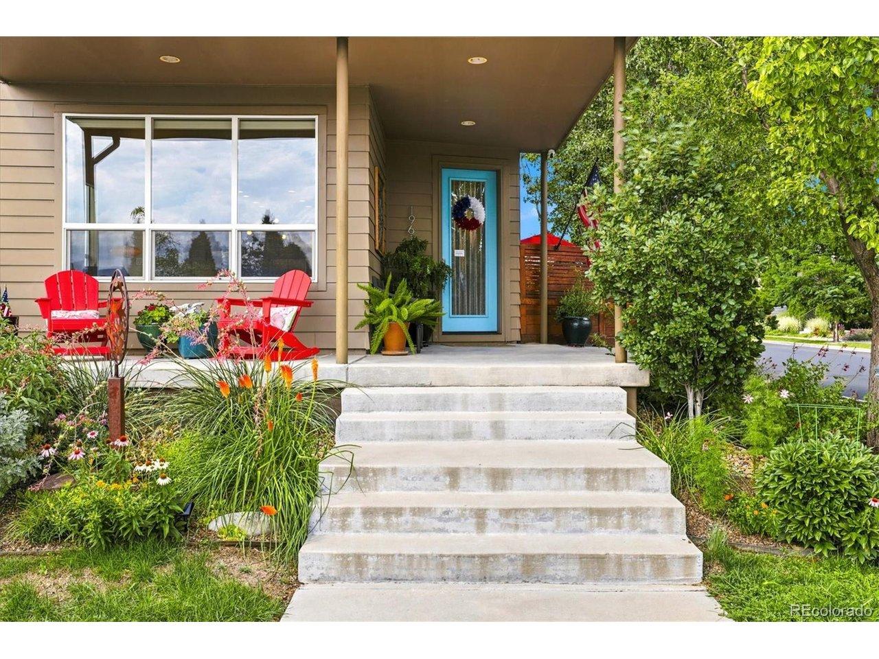 Image 2: A colorful front garden and covered porch offer an inviting place to relax and connect with the neighborhood. Image 2: A colorful front garden and covered porch offer an inviting place to relax and connect with the neighborhood.
