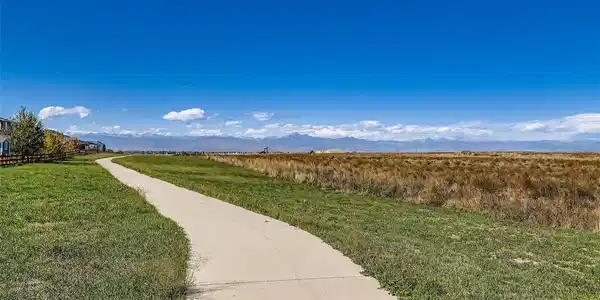 Image 4: Walking path on the large greenbelt behind the home. Enjoy the Mountain Views! Image 4: Walking path on the large greenbelt behind the home. Enjoy the Mountain Views!