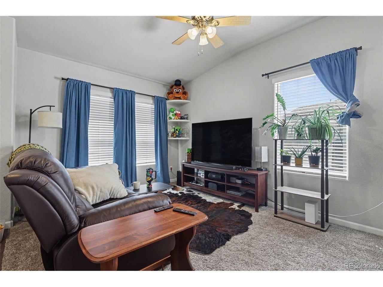 Image 4: The spacious Living Room is filled with natural lighting streaming in through the large windows found throughout the home! Image 4: The spacious Living Room is filled with natural lighting streaming in through the large windows found throughout the home!