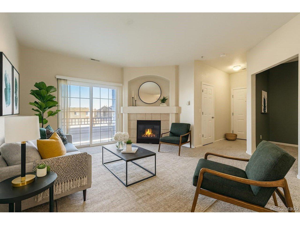 Image 2: Bright Open Living Area with Fireplace Image 2: Bright Open Living Area with Fireplace