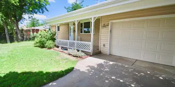 Image 3: Wide Shaded Driveway