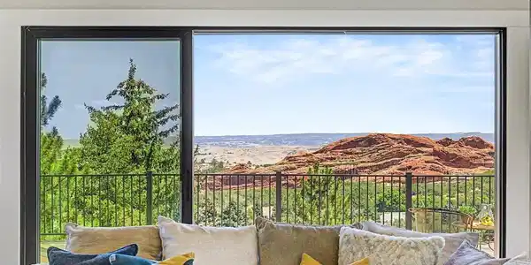 Image 4: The breathtaking red rock views take center stage in the great room, creating a spectacular backdrop for everyday living. Image 4: The breathtaking red rock views take center stage in the great room, creating a spectacular backdrop for everyday living.