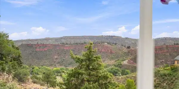Image 3: 360 mountain views. Need to see in person.