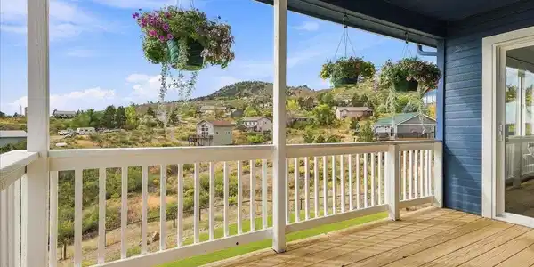 Image 4: beautifully updated porch with amazing mountain views.
