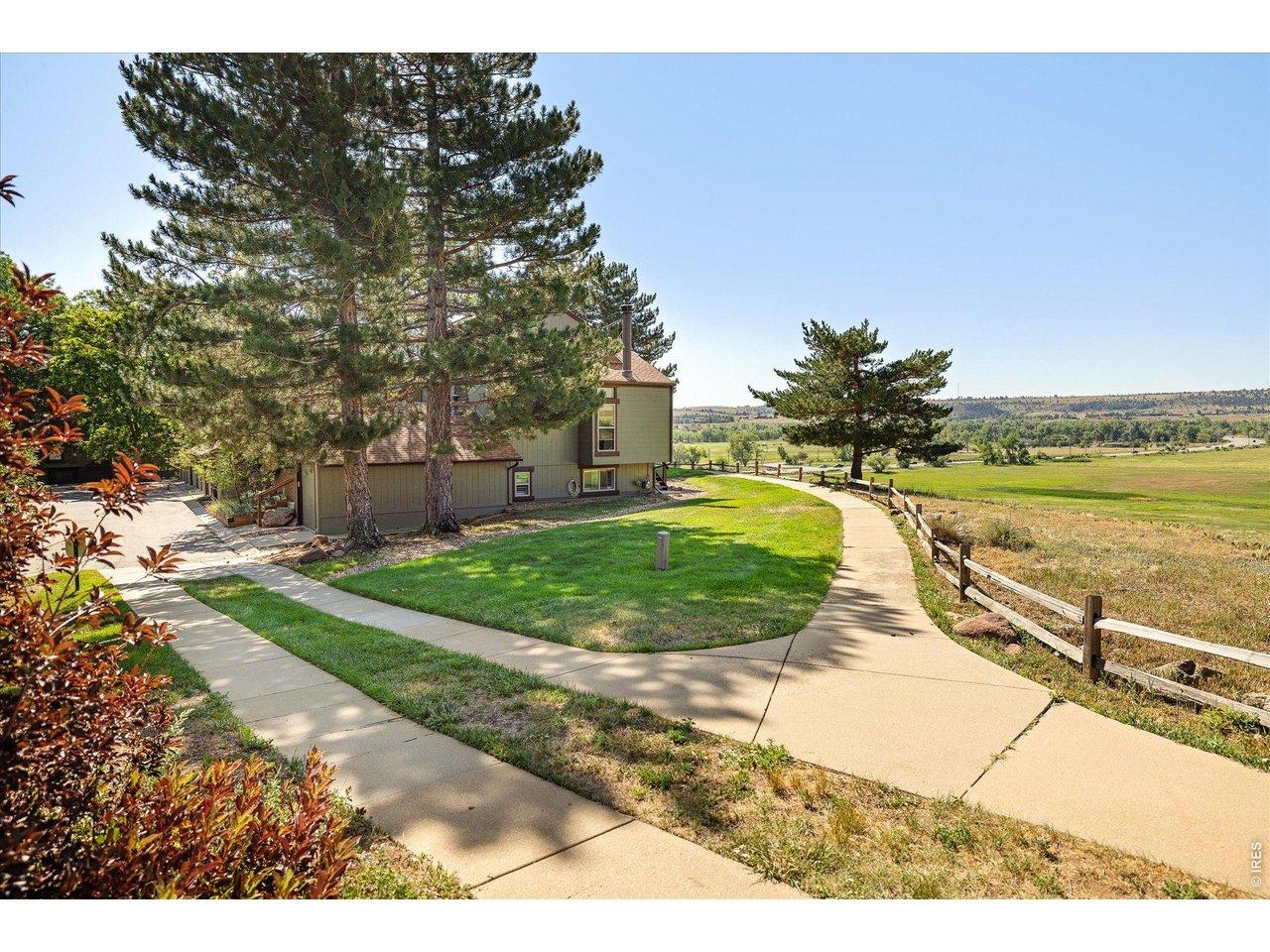 Image 2: Surrounded by open space and walking trails