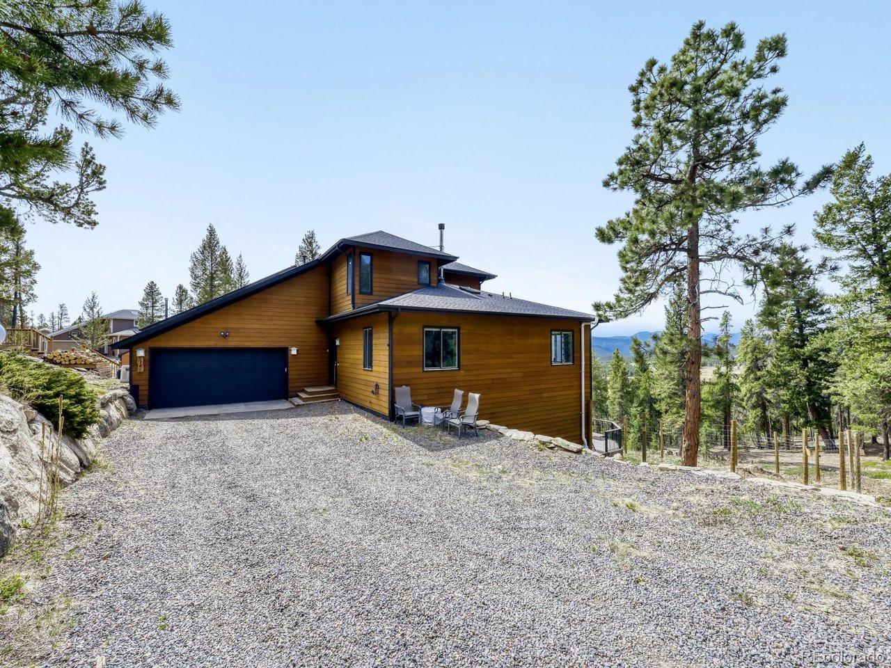 Image 3: Front of home and entrance to garage
