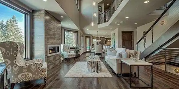 Image 2: Elegant gathering space anchored by a gas fireplace,designed for both intimate evenings and grandentertaining. Image 2: Elegant gathering space anchored by a gas fireplace,designed for both intimate evenings and grandentertaining.