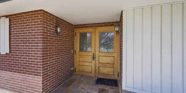 Image 2: Front doors are from the Equity Bldg downtown over 125 years old. Image 2: Front doors are from the Equity Bldg downtown over 125 years old.