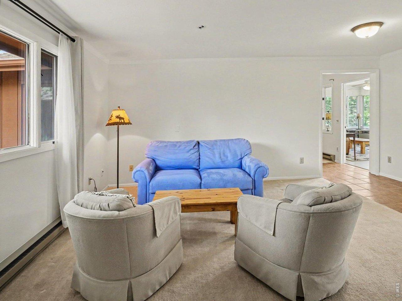 Image 3: First of two large living area - The Family Room, off the front entry hall.
