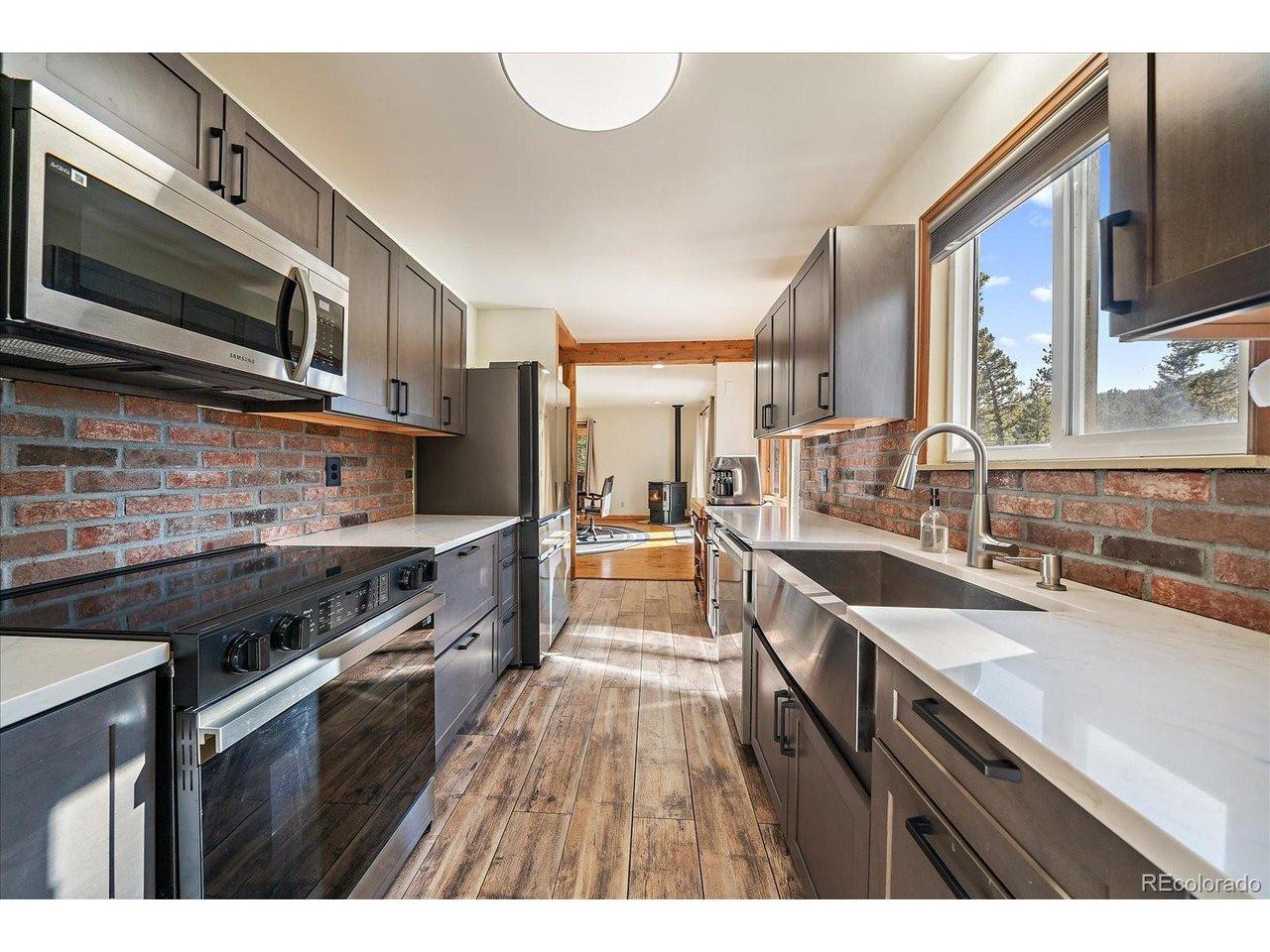 Image 3: Welcome home and enjoy a new remodeled kitchen.