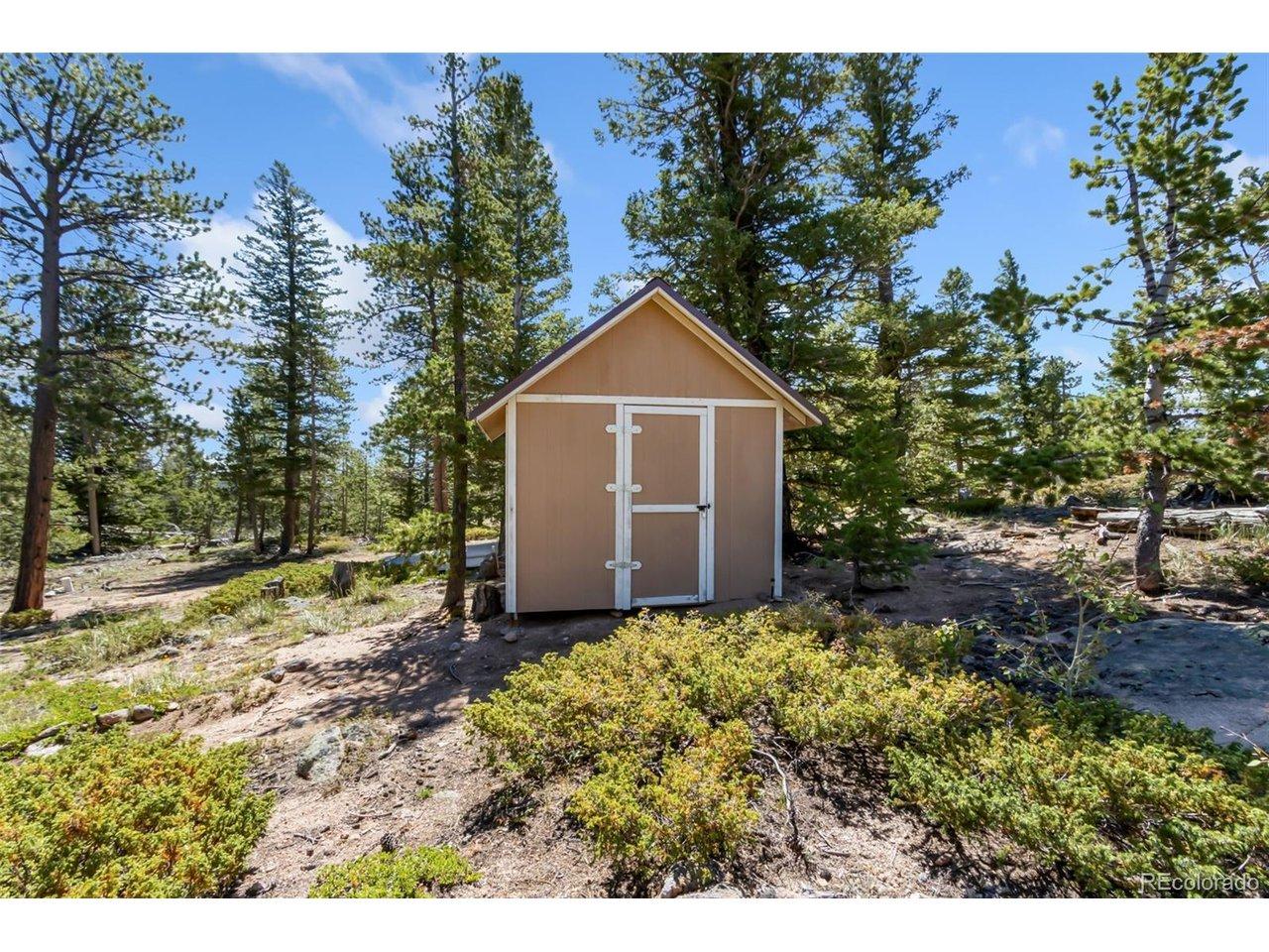Image 4: Newer Storage Shed for all your camping essentials and ATV