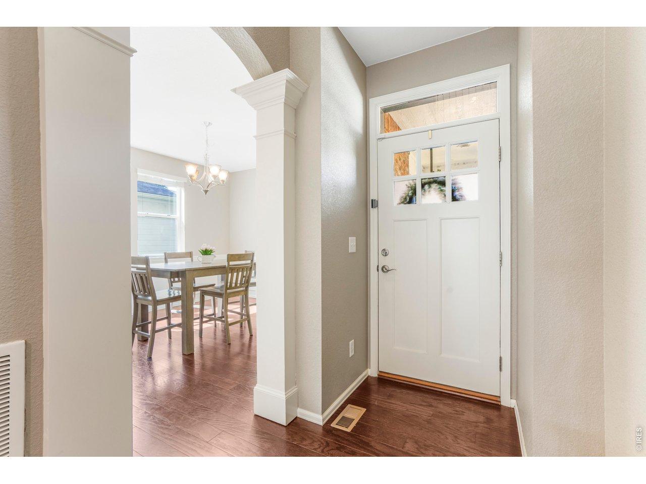 Image 4: front door and dining room Image 4: front door and dining room