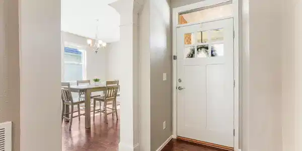 Image 4: front door and dining room
