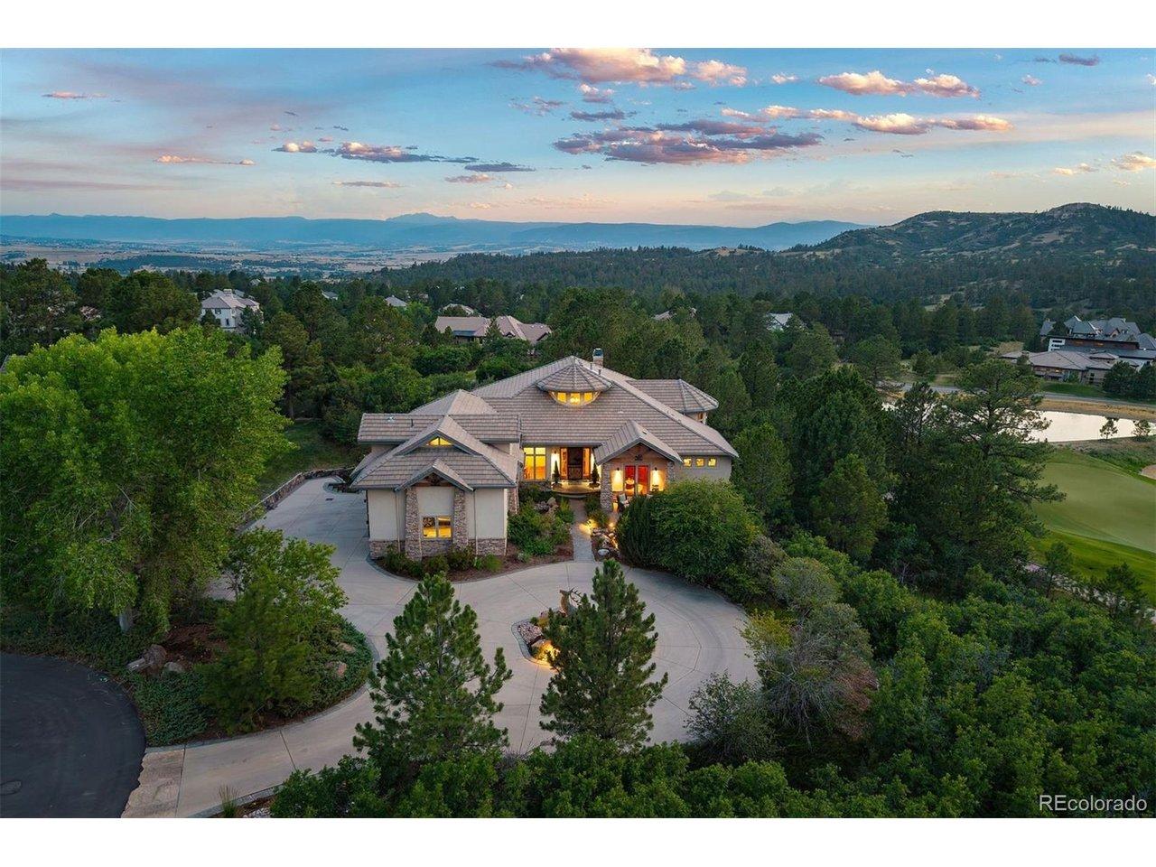 Image 1: Tucked away on a quiet cul-de-sac, this mountain contemporary is perfectly sited overlooking the sixth green/fairway and tranquil pond of the Country Club at Castle Pines, with sweeping mountain views and exceptional privacy Image 1: Tucked away on a quiet cul-de-sac, this mountain contemporary is perfectly sited overlooking the sixth green/fairway and tranquil pond of the Country Club at Castle Pines, with sweeping mountain views and exceptional privacy