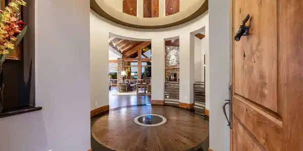 Image 4: Dramatic rotunda entry with custom inlaid wood floor and soaring ceiling Image 4: Dramatic rotunda entry with custom inlaid wood floor and soaring ceiling