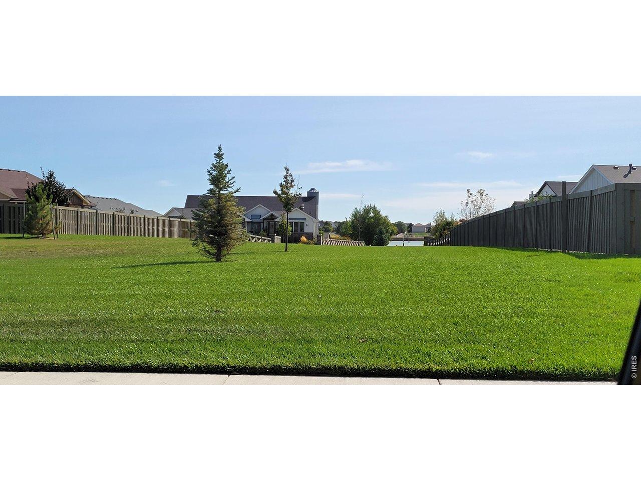 Image 3: Green space with lakeview