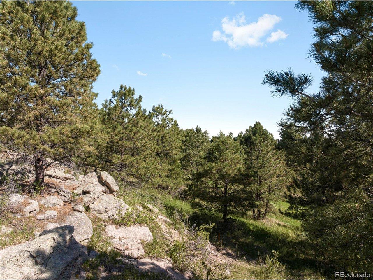 Image 4: Rock outcropping below home Image 4: Rock outcropping below home