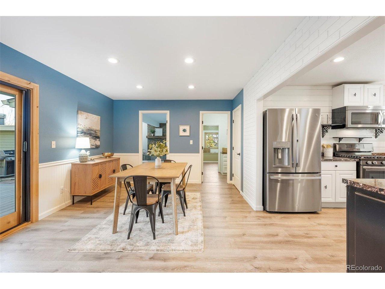 Image 4: Large dining area with open concept dining to kitchen, back deck and family room. Tons of room for entertaining!