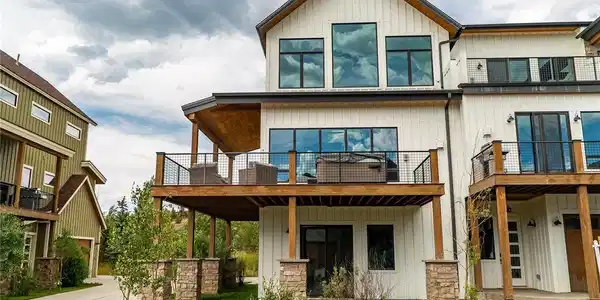 Image 2: Yes, that's a hot tub and additional seating on that deck!