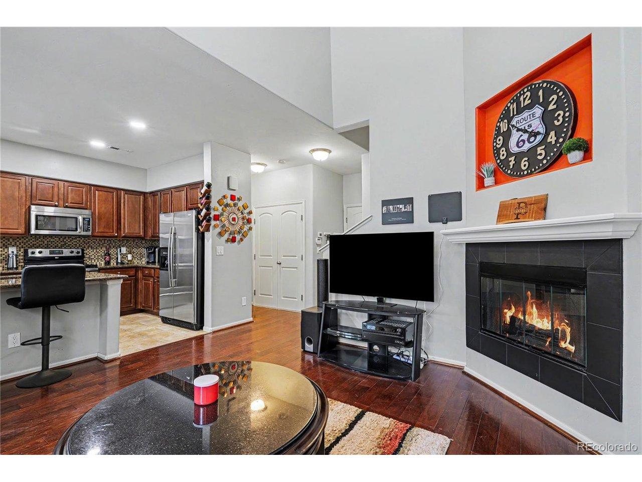 Image 3: Family Room with hardwood flooring
