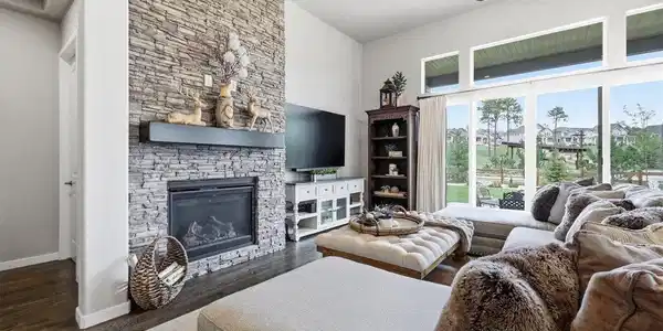 Image 2: A SHOWSTOPPING CENTERPIECE - The soaring stacked-stone fireplace brings warmth, texture, and timeless Colorado elegance to this impressive living space. Image 2: A SHOWSTOPPING CENTERPIECE - The soaring stacked-stone fireplace brings warmth, texture, and timeless Colorado elegance to this impressive living space.