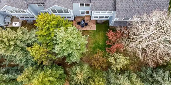Image 2: The patio is tucked in the back with towering trees creating privacy and a peaceful place to dine. Image 2: The patio is tucked in the back with towering trees creating privacy and a peaceful place to dine.